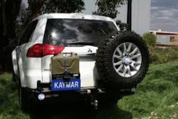 Крепление запасного колеса Kaymar к заднему бамперу (левая сторона) для Mitsubishi Pajero Sport с 2010 (К1095)