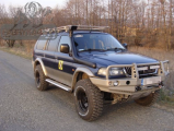 Передній бампер для Pajero SPORT (1996-2000г) (версія перед рестайлінгом, тобто з поворотниками в бампері) з плитою під лебідку і кенгурятником